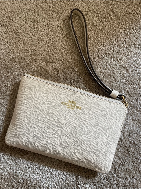 Coach Handbags - Coach Cream Pebbled Leather Wristlet with Dark Brown Strap